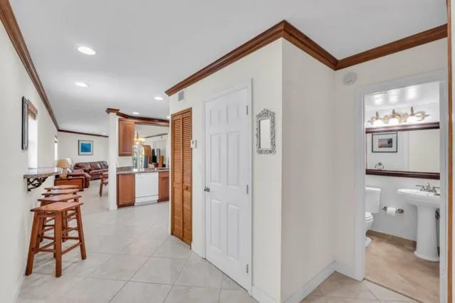 a view of a livingroom with furniture and a window