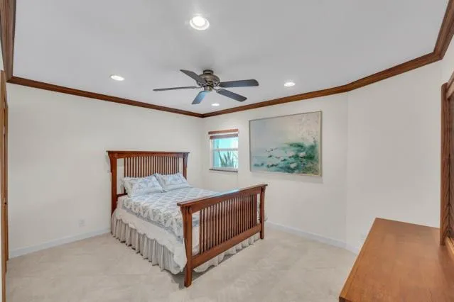 a bedroom with a bed and a table