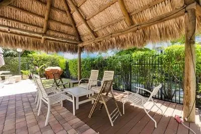 an aerial view of residential building and ocean