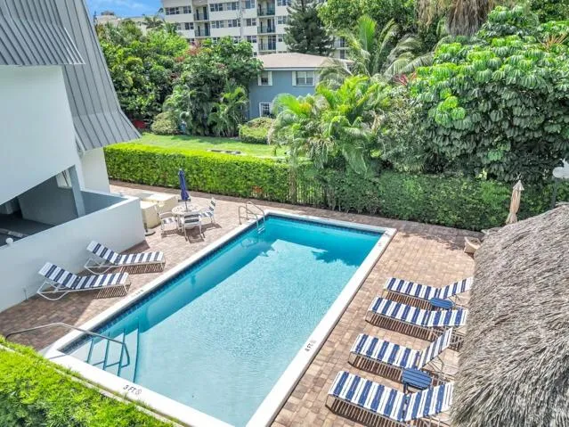 a view of a building with an ocean