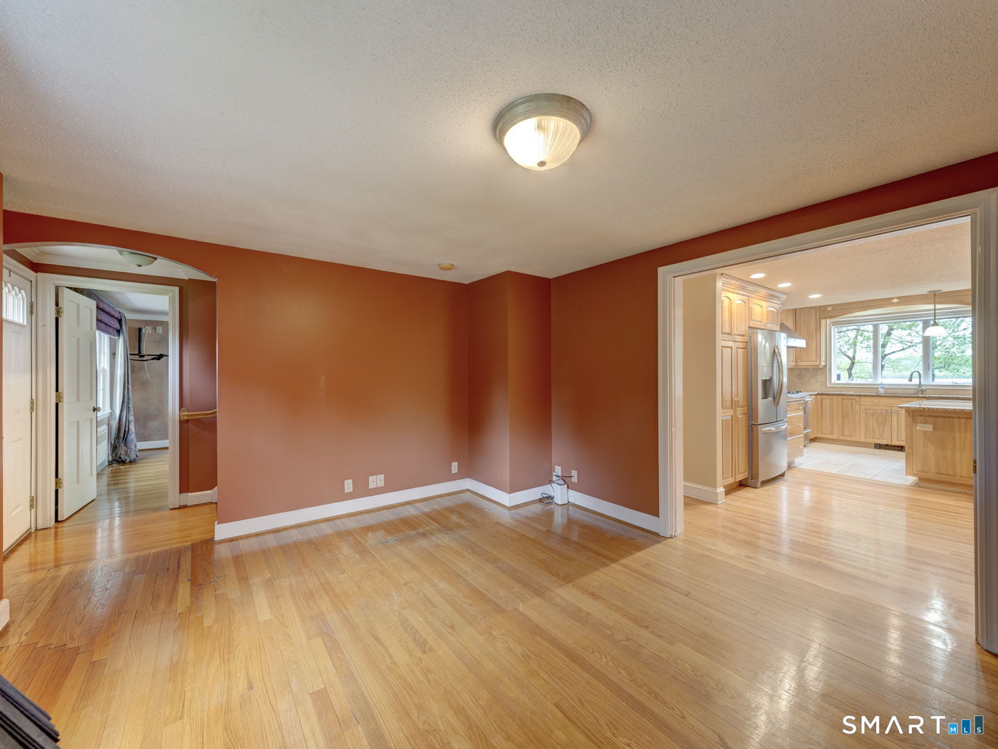501 Highland Street Wethersfield, CT 06109 - Photo 14 of 38 an empty room with wooden floor and windows