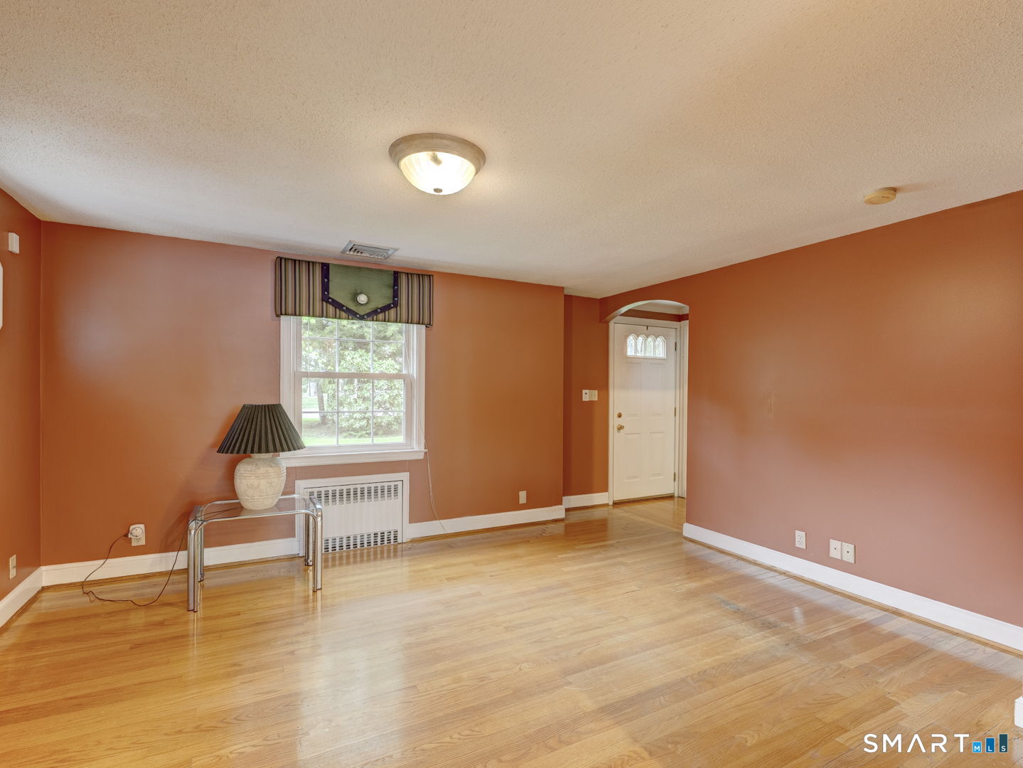 501 Highland Street Wethersfield, CT 06109 - Photo 15 of 38 a view of an empty room with a window