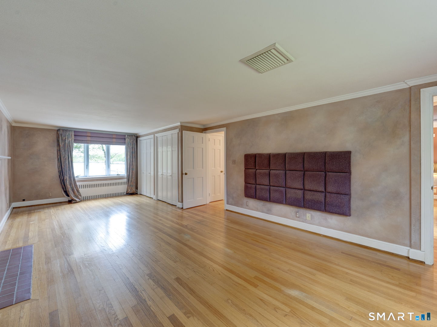 501 Highland Street Wethersfield, CT 06109 - Photo 18 of 38 an empty room with windows and cabinet