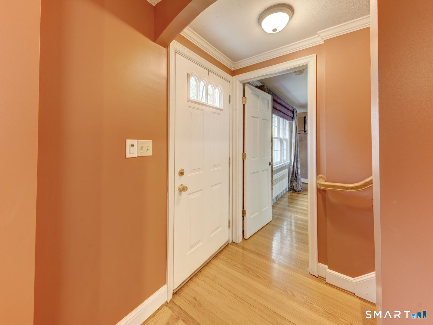 501 Highland Street Wethersfield, CT 06109 - Photo 22 of 38 a view of a hallway with wooden floor