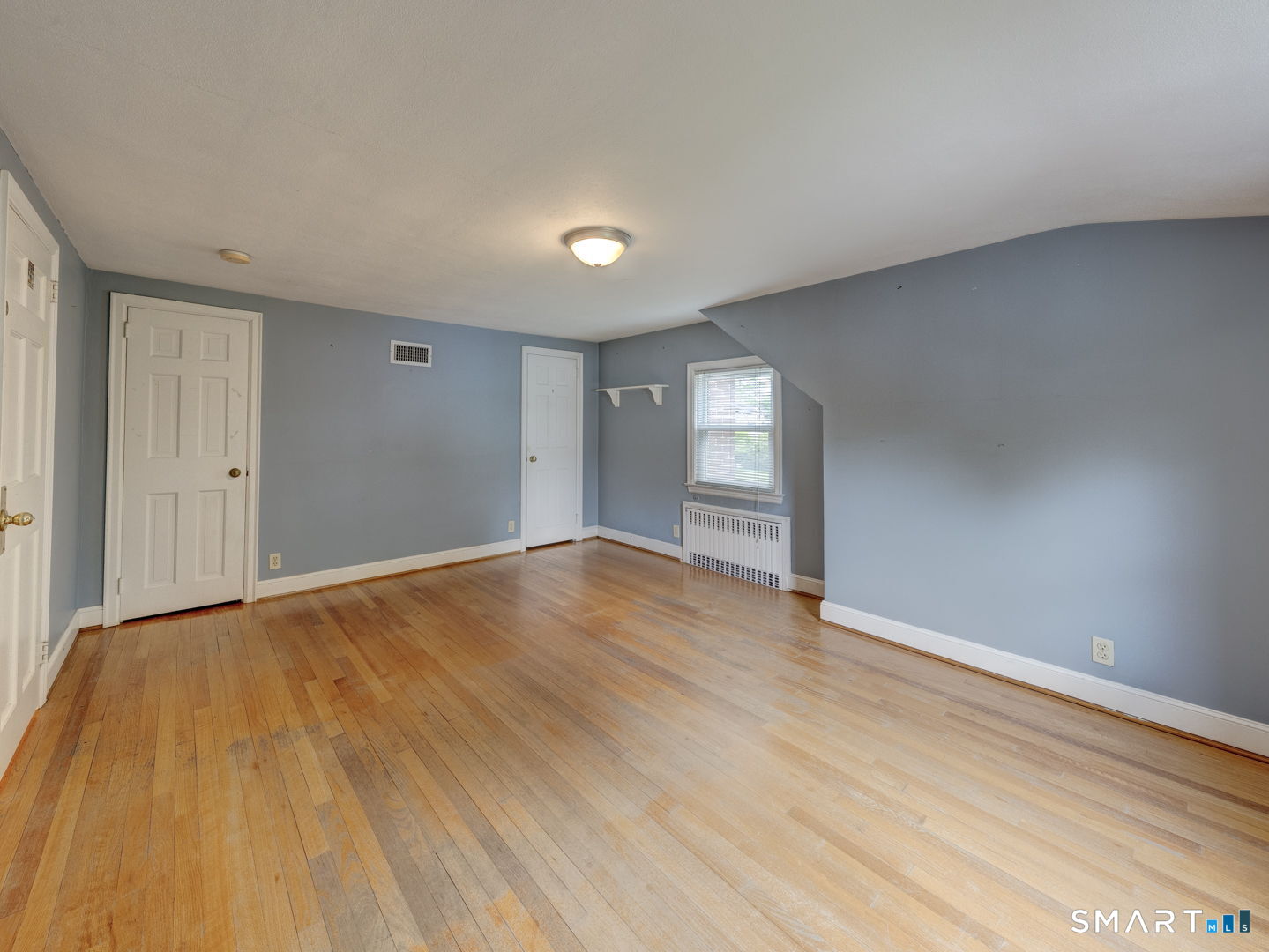 501 Highland Street Wethersfield, CT 06109 - Photo 24 of 38 a view of empty room with wooden floor