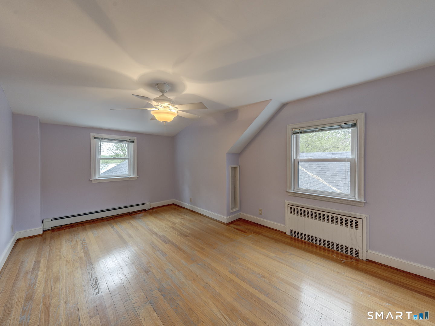 501 Highland Street Wethersfield, CT 06109 - Photo 27 of 38 an empty room with wooden floor and windows