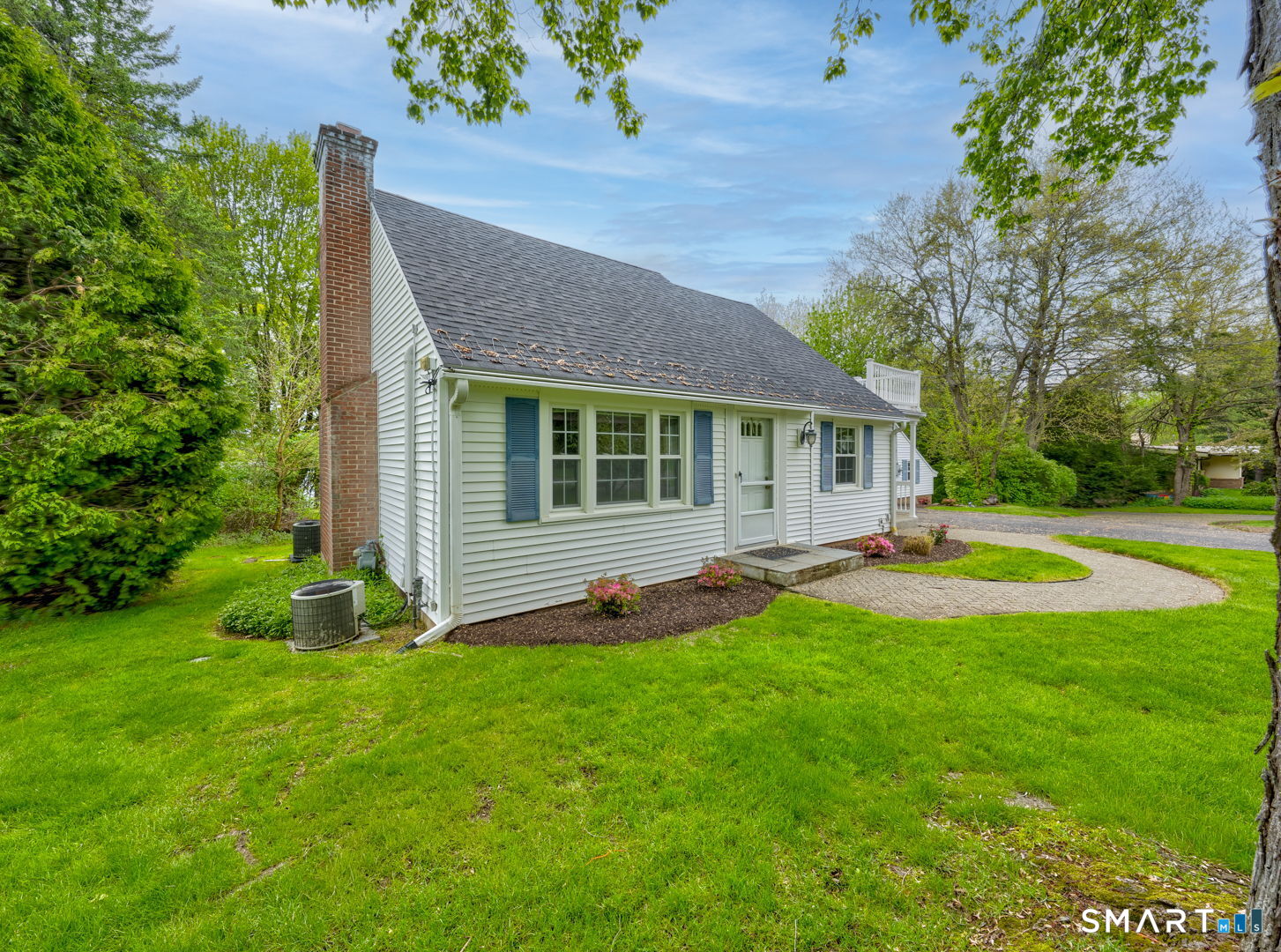 501 Highland Street Wethersfield, CT 06109 - Photo 29 of 38 a view of a house with a yard and sitting area