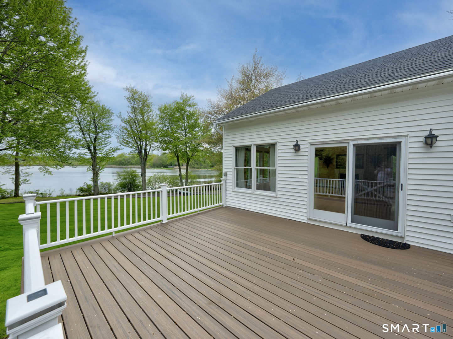 501 Highland Street Wethersfield, CT 06109 - Photo 32 of 38 a view of a deck with wooden floor and fence
