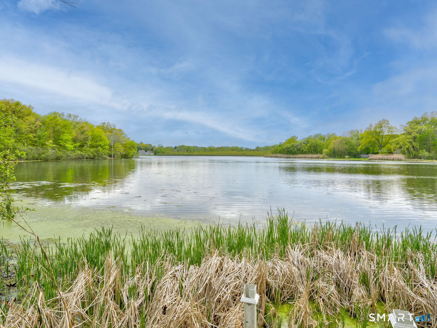 501 Highland Street Wethersfield, CT 06109 - Photo 35 of 38 a view of a lake with a big yard
