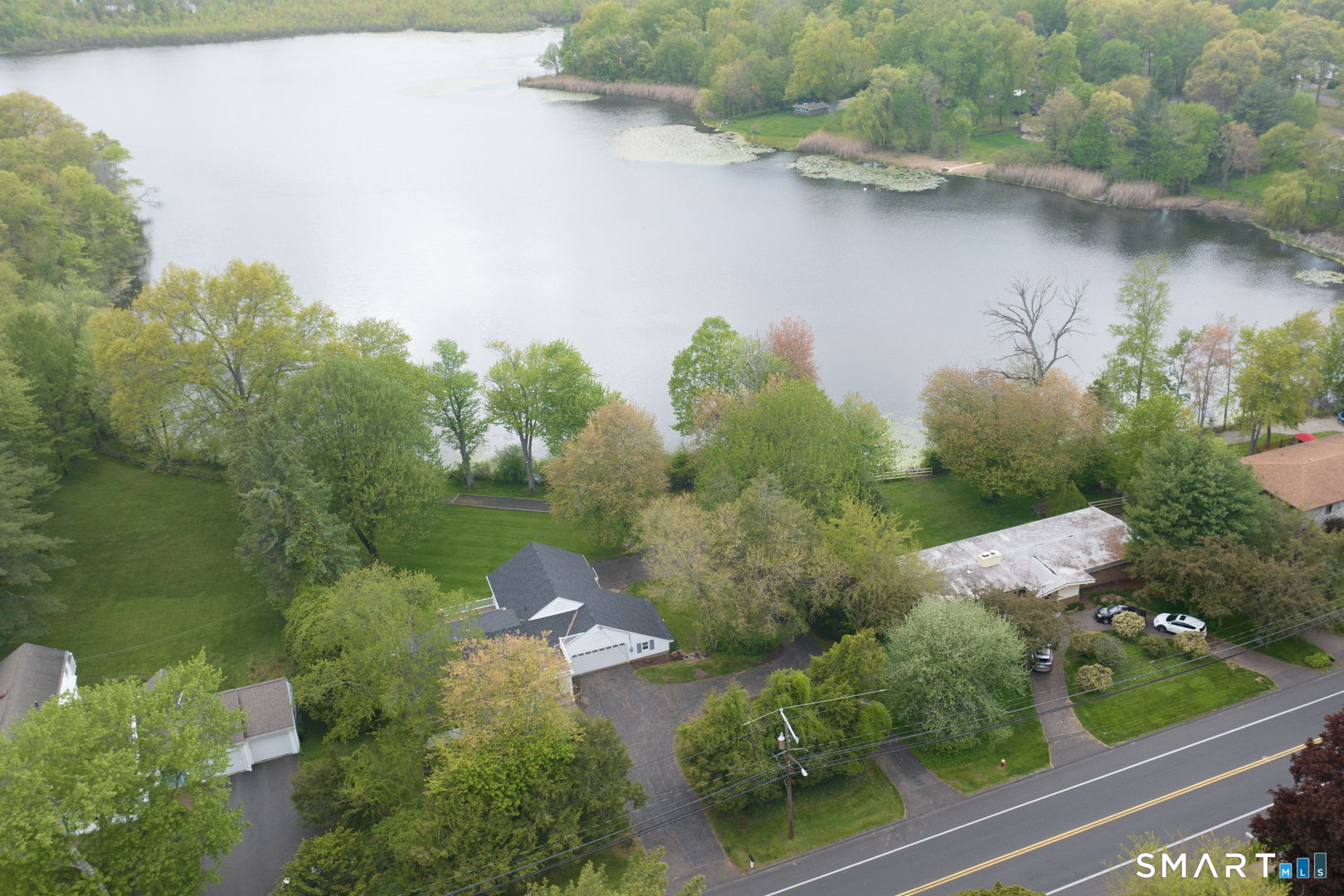 501 Highland Street Wethersfield, CT 06109 - Photo 36 of 38 an aerial view of a house with yard
