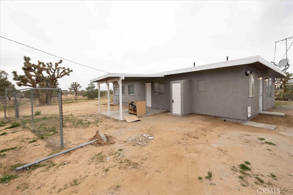 57726 Starlight Mesa Road Yucca Valley, CA 92284 - Photo 56 of 75 a backyard of a house