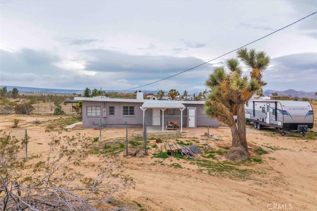 57726 Starlight Mesa Road Yucca Valley, CA 92284 - Photo 66 of 75 a house view with a garden space