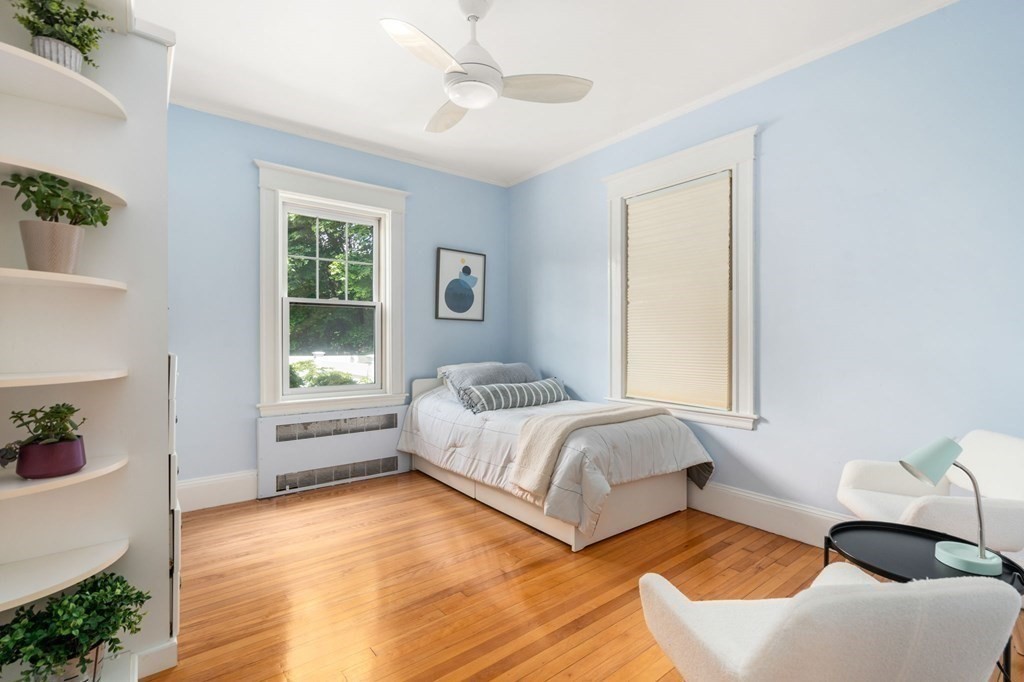 25 Windsor Road Brookline, MA 02445 - Photo 18 of 31 a spacious bedroom with a bed and a window