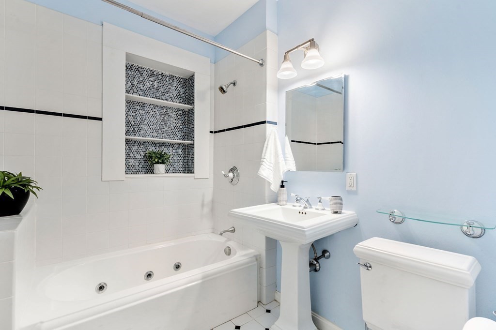 25 Windsor Road Brookline, MA 02445 - Photo 19 of 31 a bathroom with a sink a toilet and shower