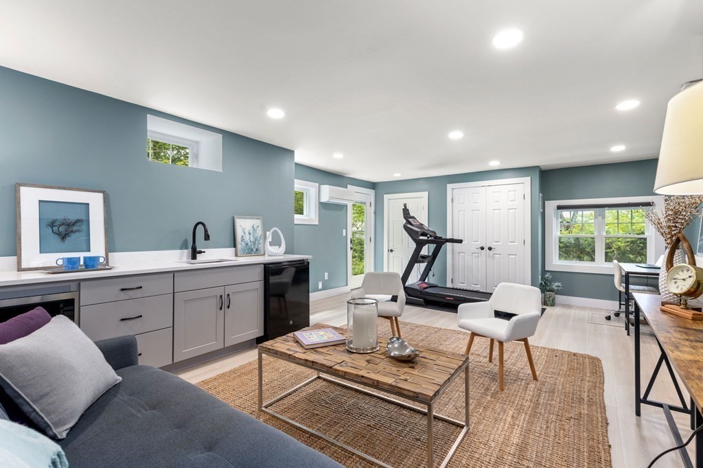 25 Windsor Road Brookline, MA 02445 - Photo 22 of 31 a view of a livingroom with furniture and a window