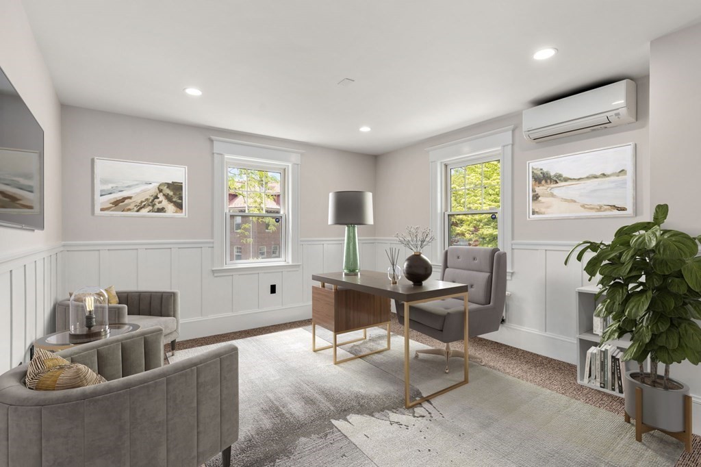 25 Windsor Road Brookline, MA 02445 - Photo 24 of 31 a living room with furniture and a large window