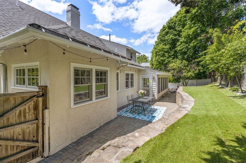 25 Windsor Road Brookline, MA 02445 - Photo 29 of 31 a front view of house with deck and yard