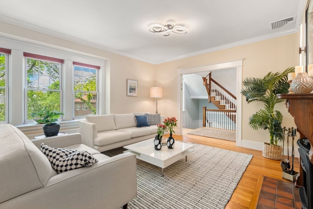 25 Windsor Road Brookline, MA 02445 - Photo 3 of 31 a living room with furniture and a large window