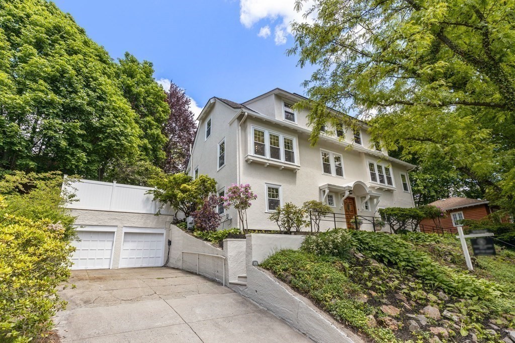 25 Windsor Road Brookline, MA 02445 - Photo 31 of 31 a front view of a house with a yard