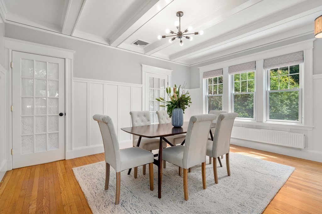25 Windsor Road Brookline, MA 02445 - Photo 6 of 31 a view of a dining room with furniture window and wooden floor