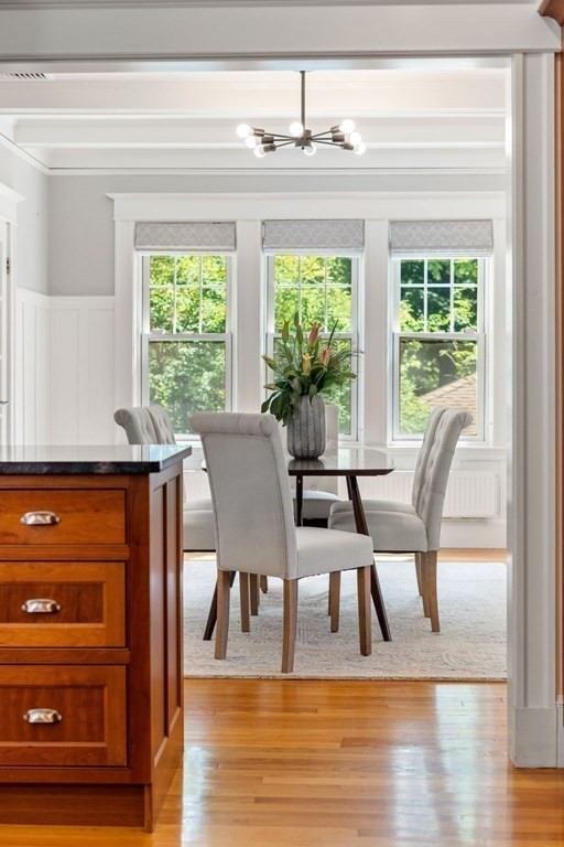 25 Windsor Road Brookline, MA 02445 - Photo 9 of 31 a view of a dining room with furniture window and wooden floor