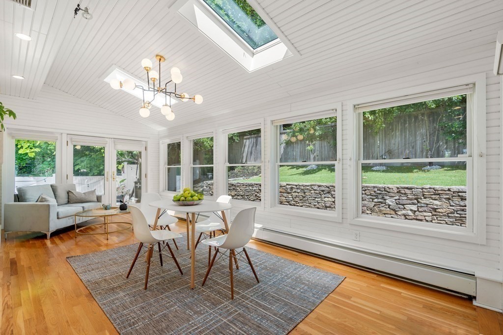 25 Windsor Road Brookline, MA 02445 - Photo 10 of 31 a living room with furniture and a large window