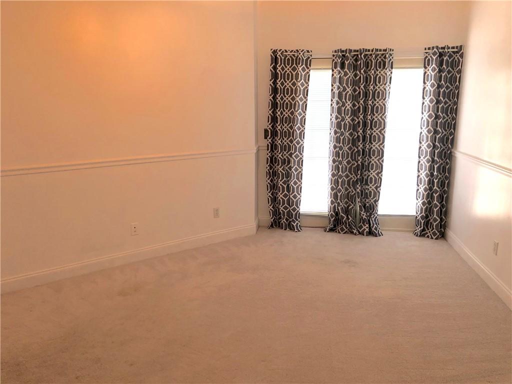 211 Adams Pointe Boulevard, Unit 10 Mars, PA 16046 - Photo 12 of 33 an empty room with windows