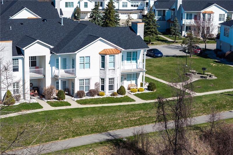 211 Adams Pointe Boulevard, Unit 10 Mars, PA 16046 - Photo 2 of 33 a aerial view of a house with a yard