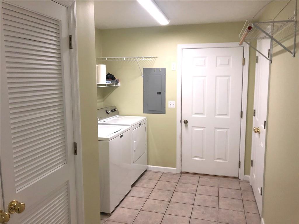 211 Adams Pointe Boulevard, Unit 10 Mars, PA 16046 - Photo 26 of 33 a bathroom with a sink a toilet and shower