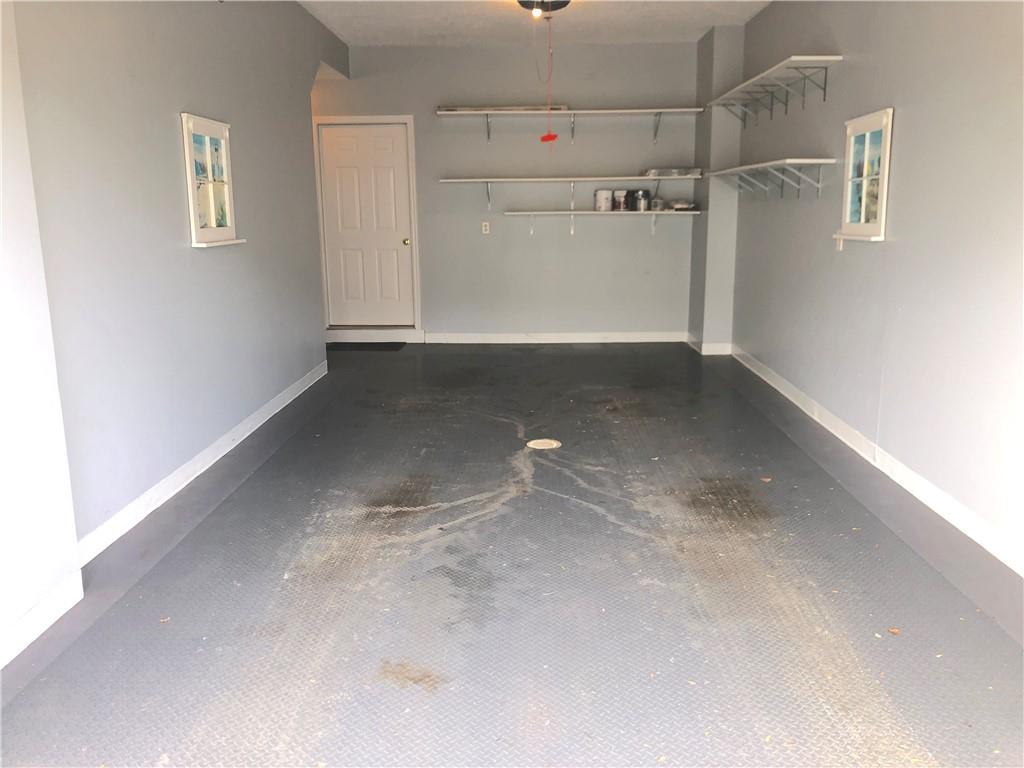 211 Adams Pointe Boulevard, Unit 10 Mars, PA 16046 - Photo 27 of 33 a view of a room with an empty space