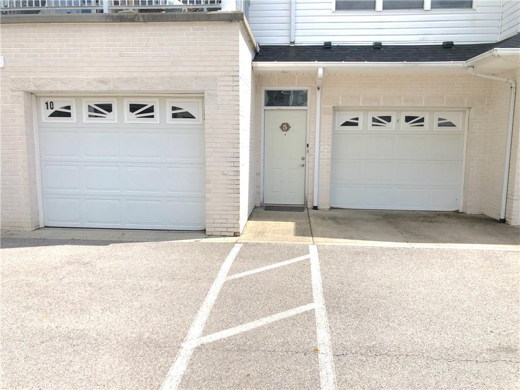 211 Adams Pointe Boulevard, Unit 10 Mars, PA 16046 - Photo 4 of 33 a view of a garage