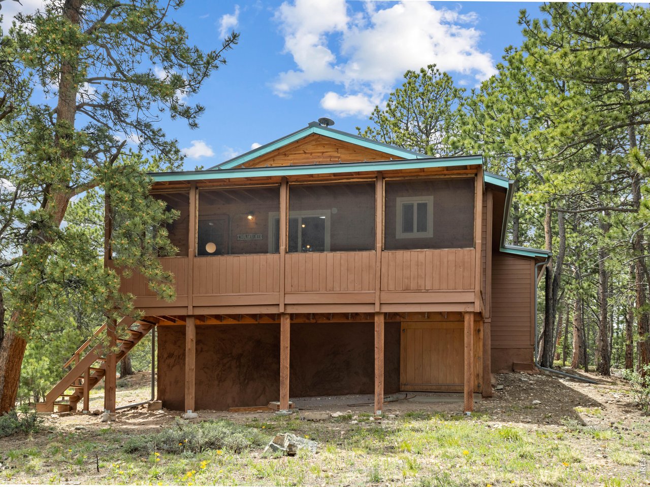 270 Ski Road East Allenspark, CO 80510 - Photo 3 of 30 Screened in Back Porch