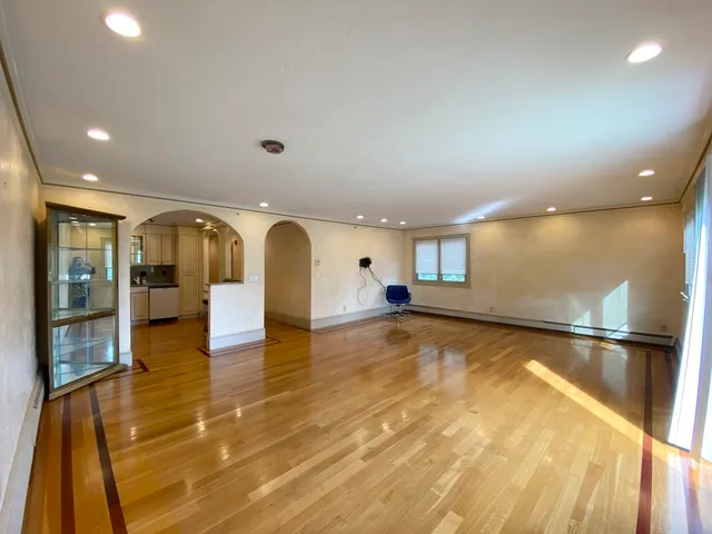 a view of a living room and dining room