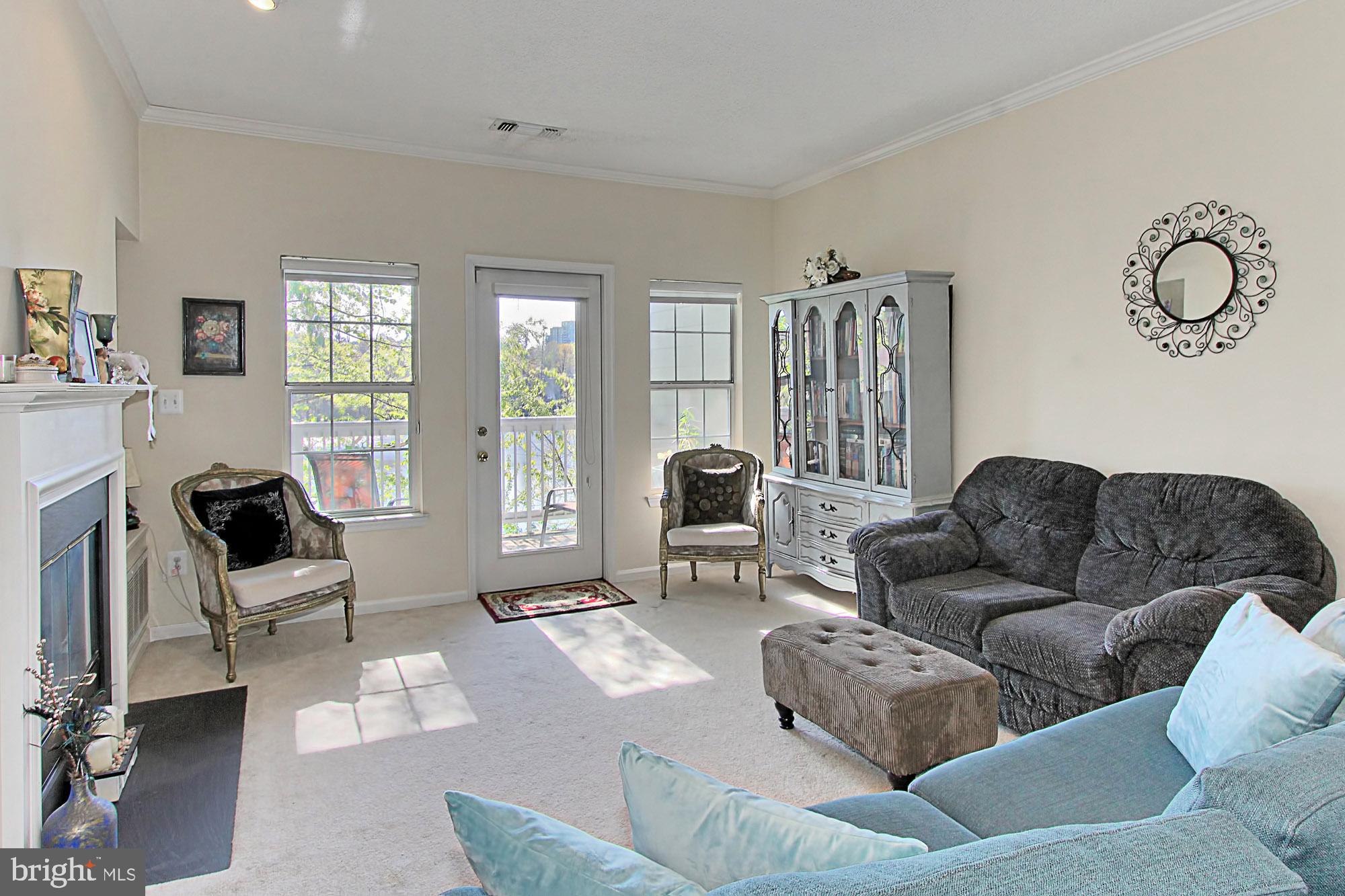 1708 Lake Shore Crest Drive, Unit 24 Reston, VA 20190 - Photo 12 of 29 Family Room Opens to Private Balcony