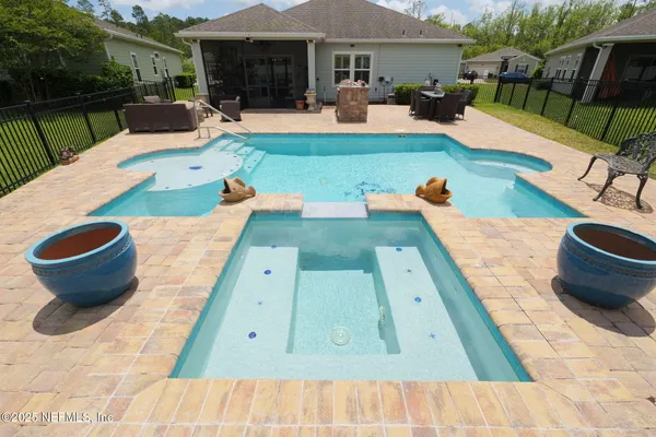 a front view of house with outdoor space