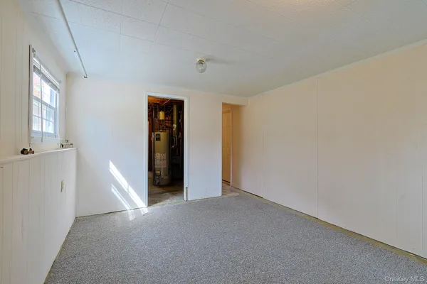a view of an empty room with window