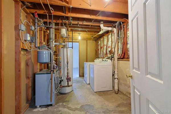 a view of a room with storage and utility room