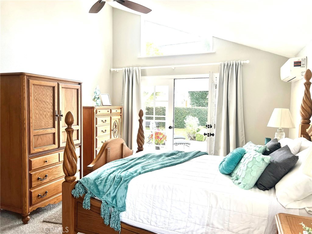 520 West 37th Street Long Beach, CA 90806 - Photo 13 of 50 a bedroom with a large bed and a large window