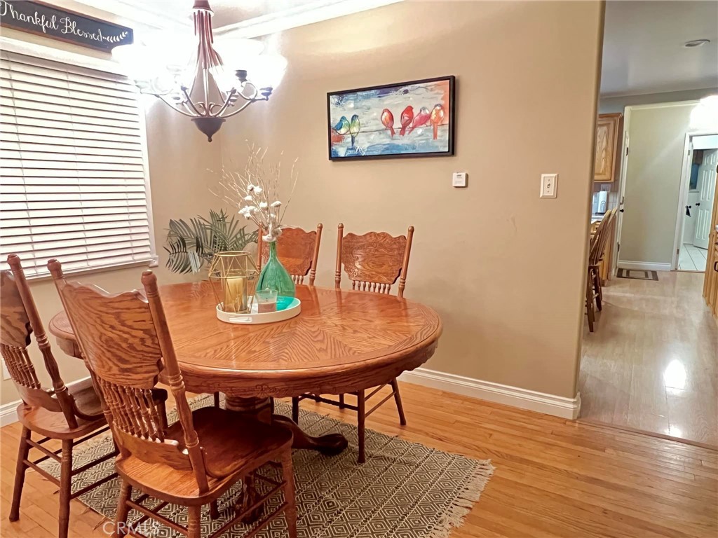 520 West 37th Street Long Beach, CA 90806 - Photo 32 of 50 a view of a dining room with furniture and wooden floor