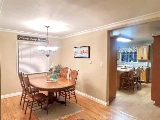 a kitchen with stainless steel appliances granite countertop a refrigerator stove microwave and sink