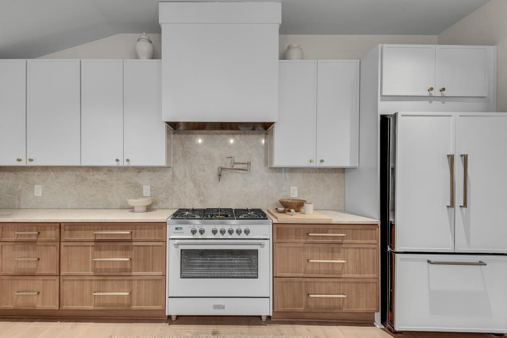 2362 Greenglade Road Northeast Atlanta, GA 30345 - Photo 18 of 39 a kitchen with cabinets appliances and a counter space