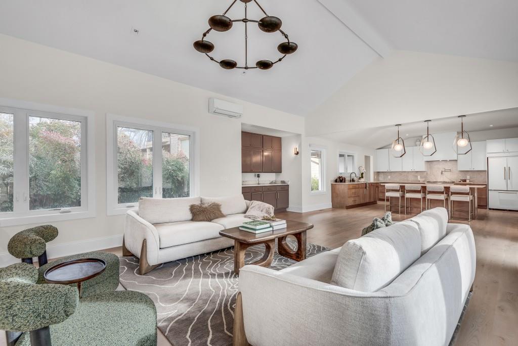 2362 Greenglade Road Northeast Atlanta, GA 30345 - Photo 30 of 39 a living room with furniture potted plant and a large window