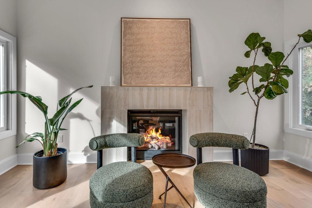 2362 Greenglade Road Northeast Atlanta, GA 30345 - Photo 31 of 39 a living room with furniture potted plant and a fireplace