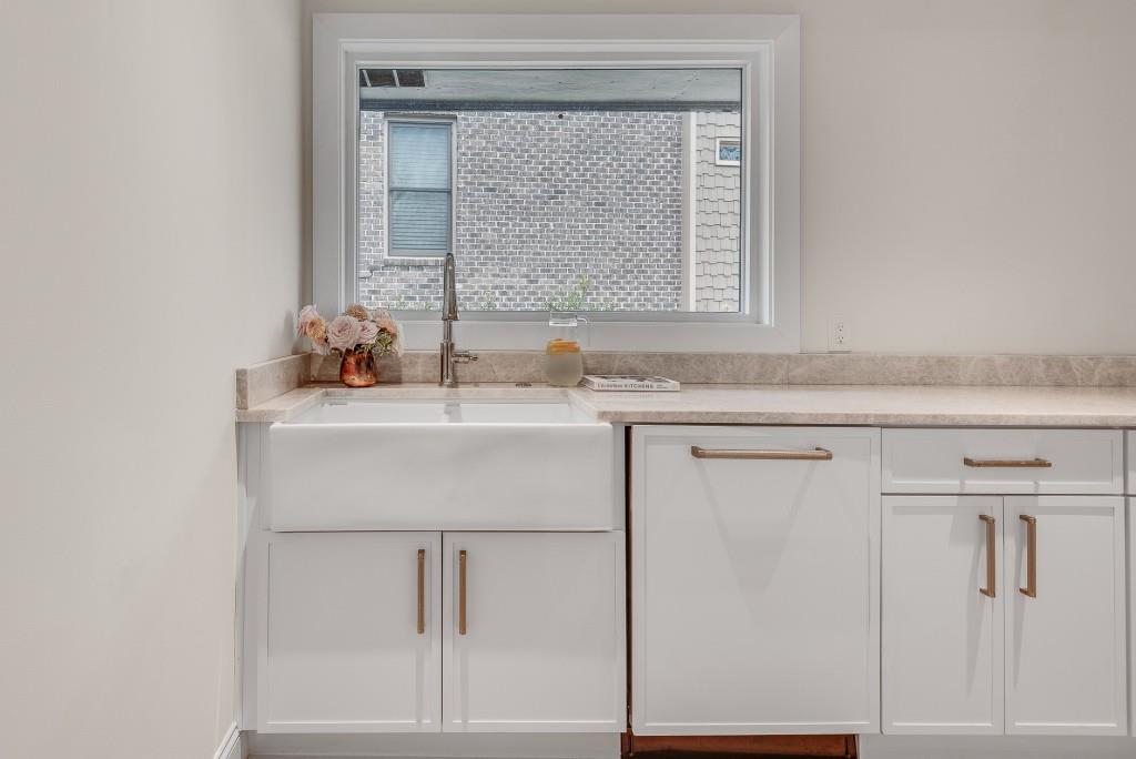 2362 Greenglade Road Northeast Atlanta, GA 30345 - Photo 33 of 39 a bathroom with a sink and a mirror