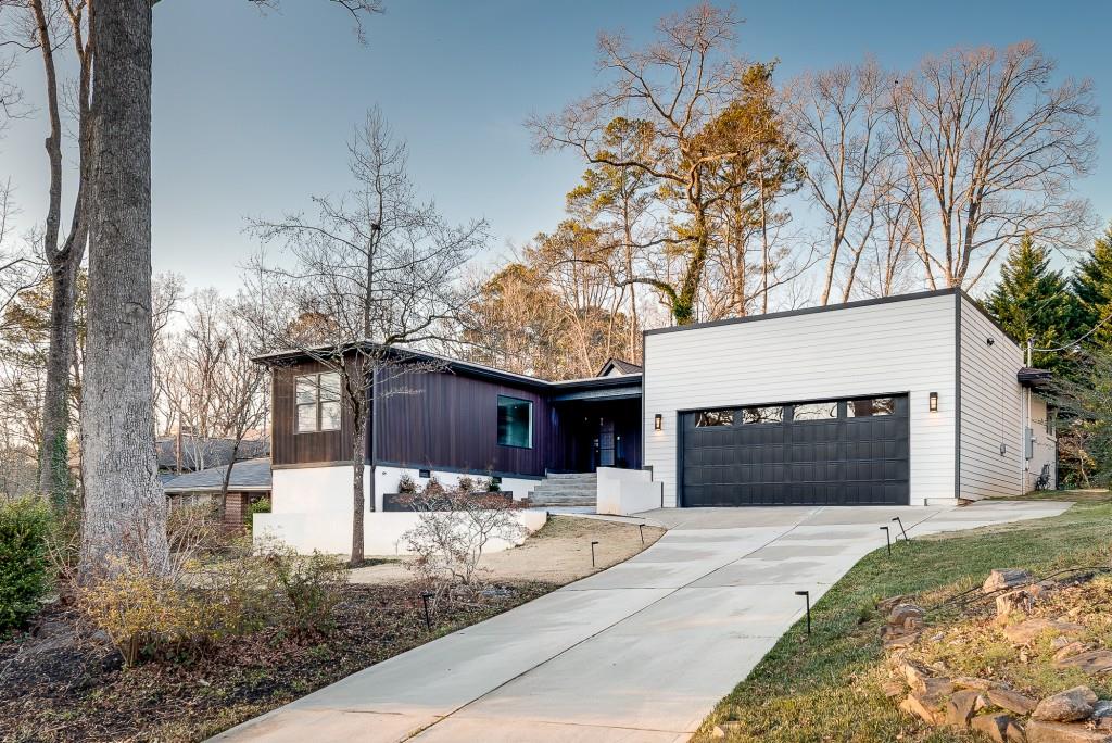 2362 Greenglade Road Northeast Atlanta, GA 30345 - Photo 39 of 39 a front view of a house with a yard and garage