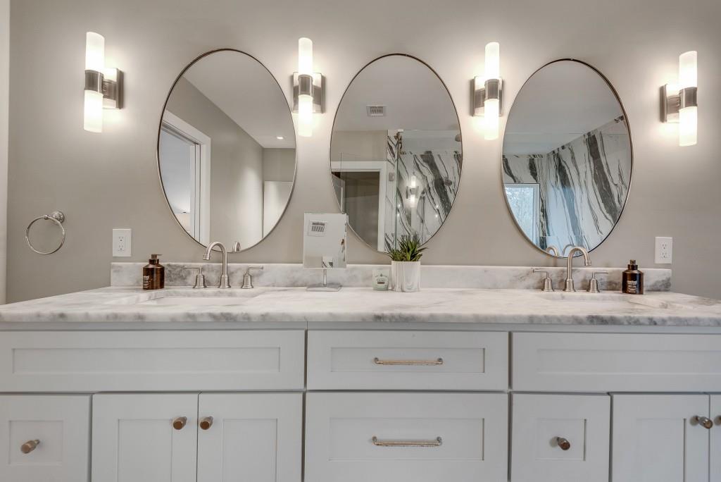 2362 Greenglade Road Northeast Atlanta, GA 30345 - Photo 7 of 39 a bathroom with double vanity sinks and a mirror
