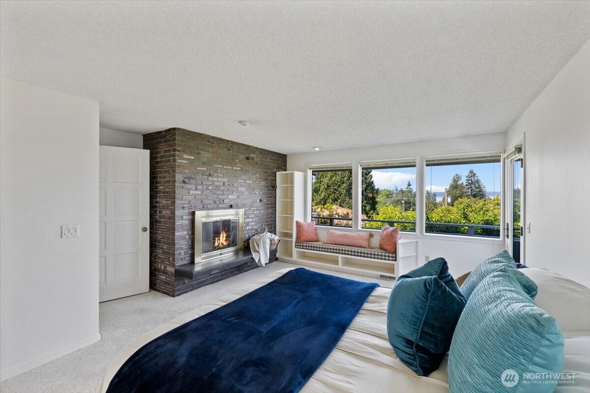 2606 49th Place Southwest Everett, WA 98203 - Photo 12 of 37 a living room with furniture and a fireplace