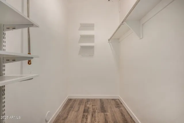 a view of small space with racks on the wall