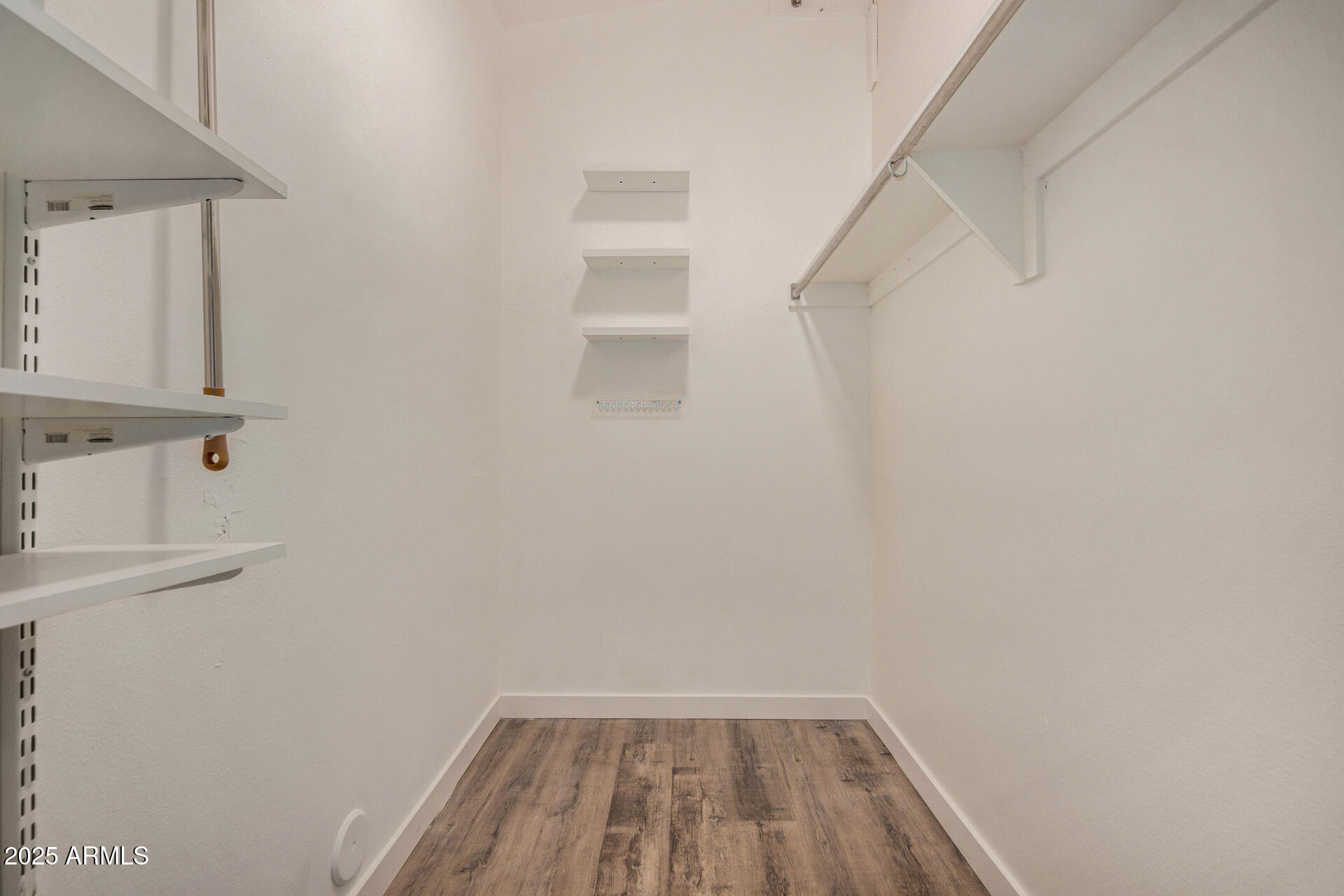 421 East Wickieup Lane Phoenix, AZ 85024 - Photo 11 of 24 a view of small space with racks on the wall