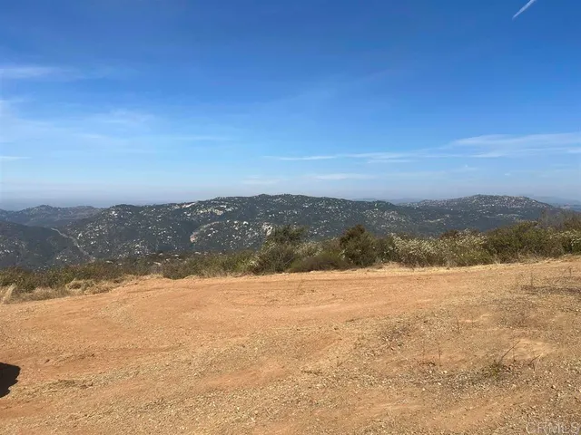 a view of lake and mountain